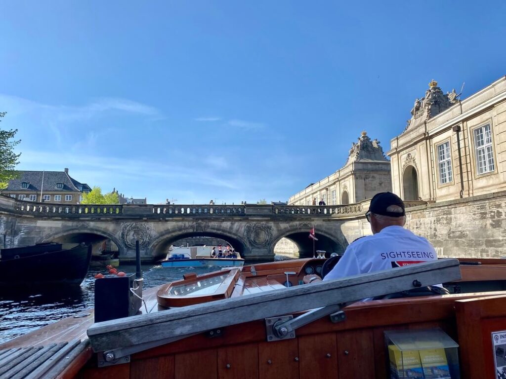 View from inside a boat approaching a low bridge