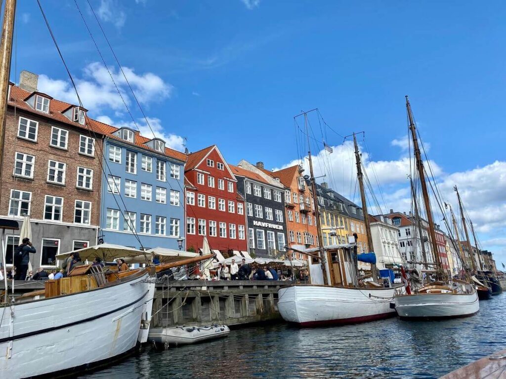 View from the Copenhagen canal of fishing boats and colorful houses